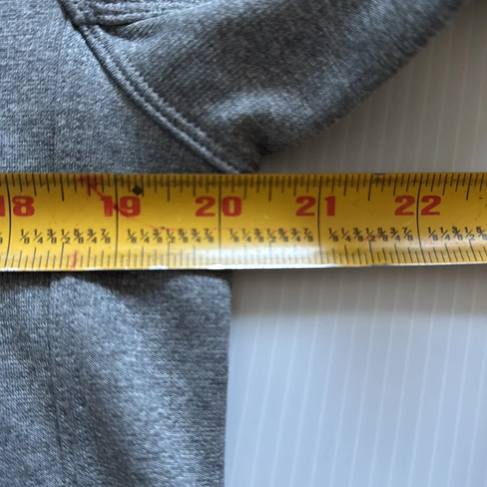 The North Face Men’s gray quarter zip with blue details.  Size medium